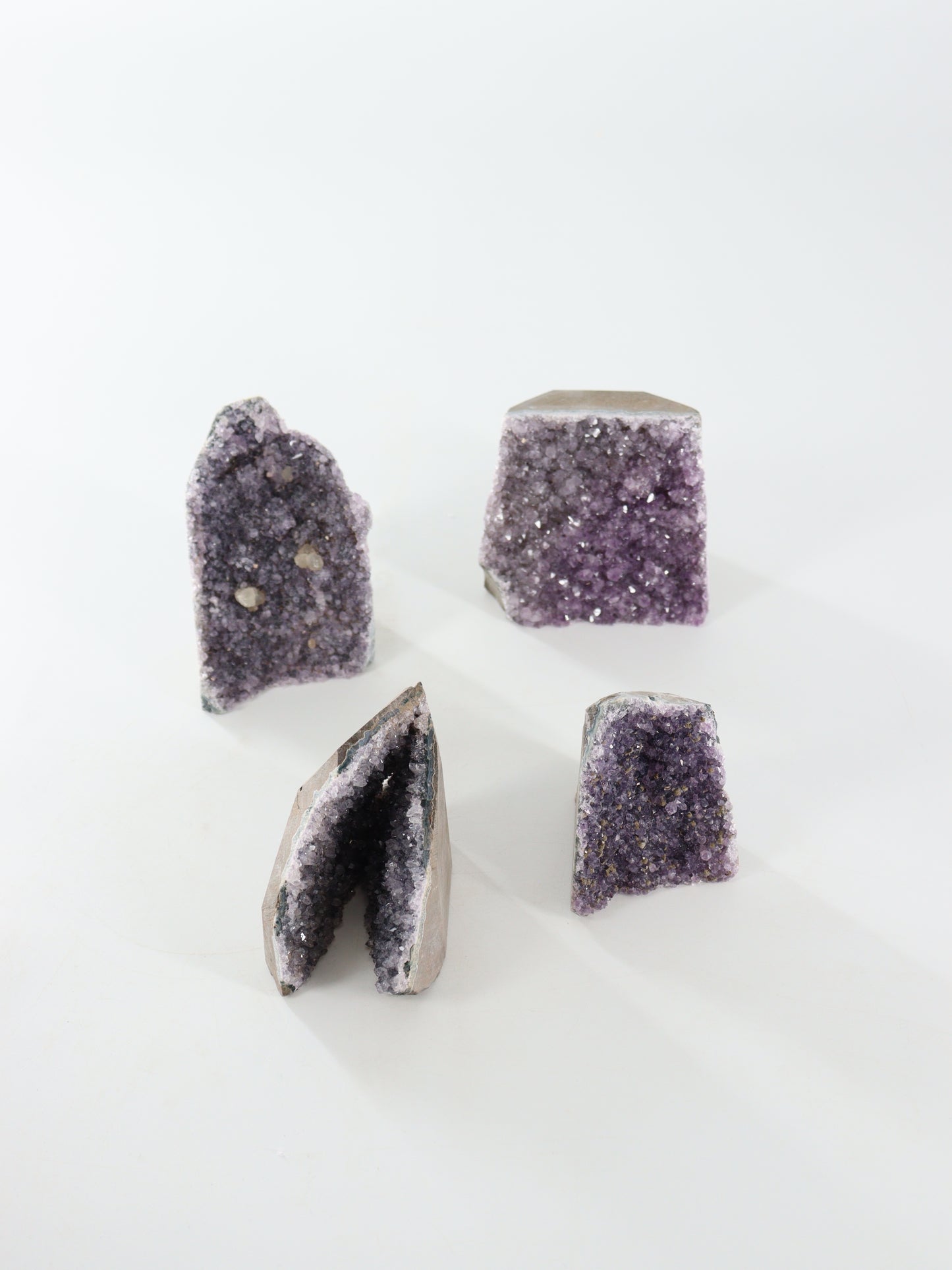 Amethyst Cut Base Set of 4 - Expert Wholesale and Supplier of Wholesale Crystals & Bulk Gemstones, ["Amethyst","close_70","Cut Base"]