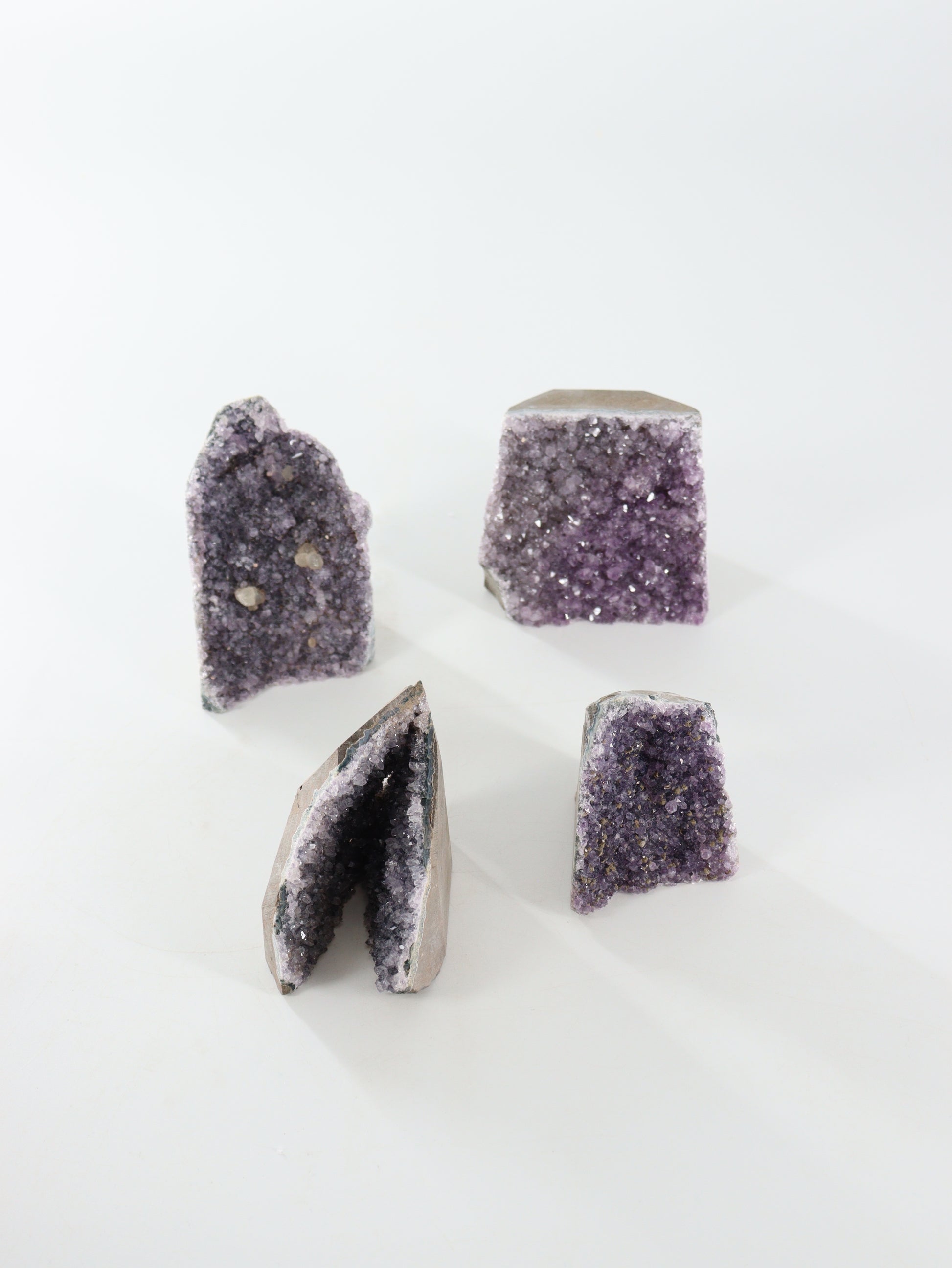 Amethyst Cut Base Set of 4 - Expert Wholesale and Supplier of Wholesale Crystals & Bulk Gemstones, ["Amethyst","close_70","Cut Base"]