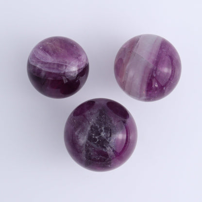 Purple Fluorite Spheres Set of 9 - Expert Wholesale and Supplier of Wholesale Crystals & Bulk Gemstones, ["Fluorite","Purple Fluorite","Spheres"]
