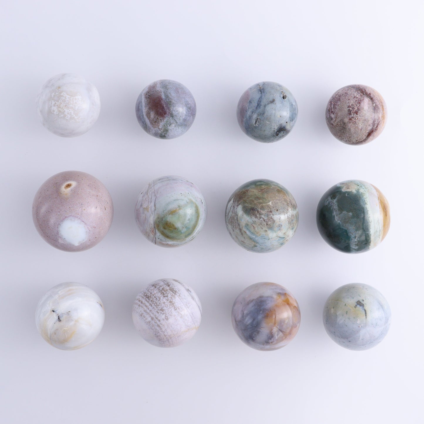 Ocean Jasper Spheres Set of 12 - Expert Wholesale and Supplier of Wholesale Crystals & Bulk Gemstones, ["jasper","Madagascar","Ocean Jasper","Spheres"]