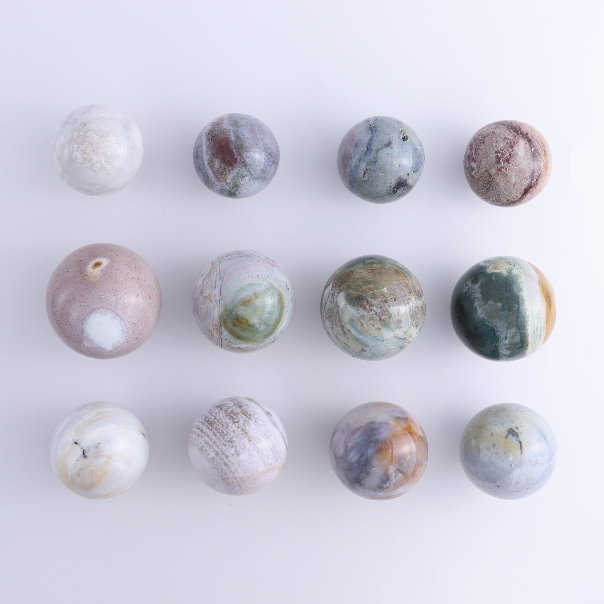 Ocean Jasper Spheres Set of 12 - Expert Wholesale and Supplier of Wholesale Crystals & Bulk Gemstones, ["jasper","Madagascar","Ocean Jasper","Spheres"]