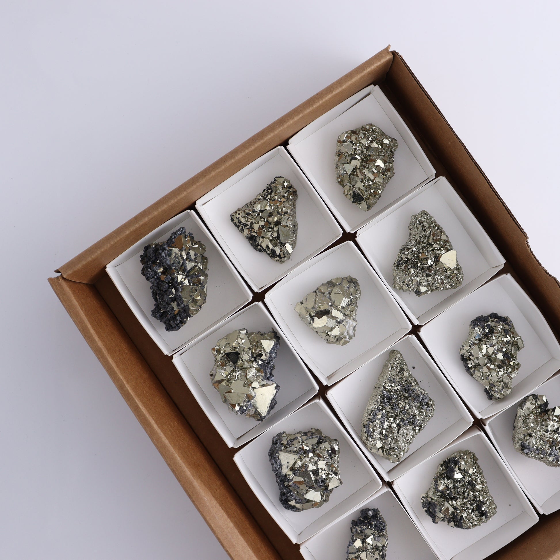 Octahedral Pyrite Clusters Set of 12 - Expert Wholesale and Supplier of Wholesale Crystals & Bulk Gemstones, ["Clusters","Octahedral Pyrite","Peru","Pyrite"]