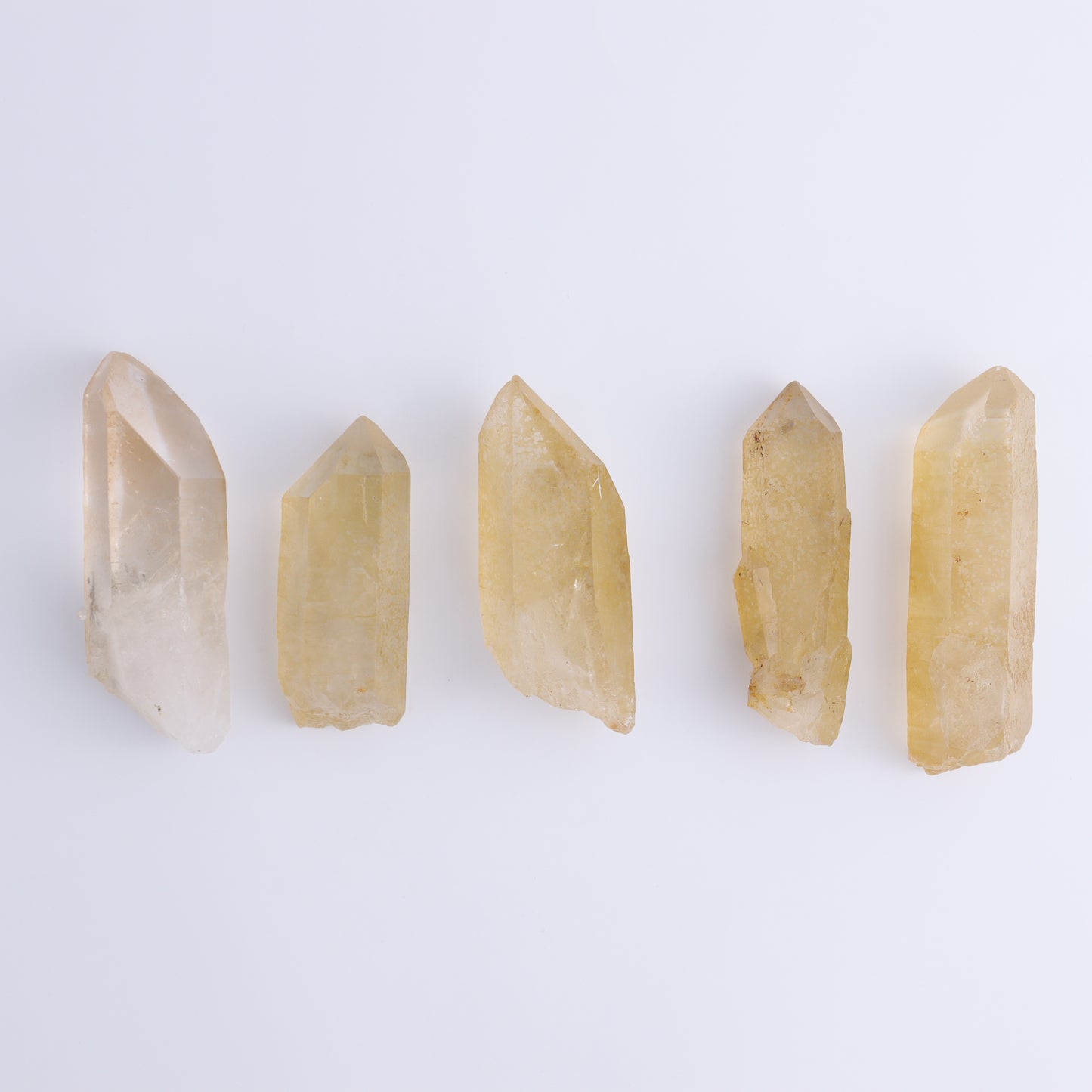 Tangerine Quartz Rough Towers Set of 16 - Expert Wholesale and Supplier of Wholesale Crystals & Bulk Gemstones, ["Quartz","Rough","Tangerine Quartz","Towers"]