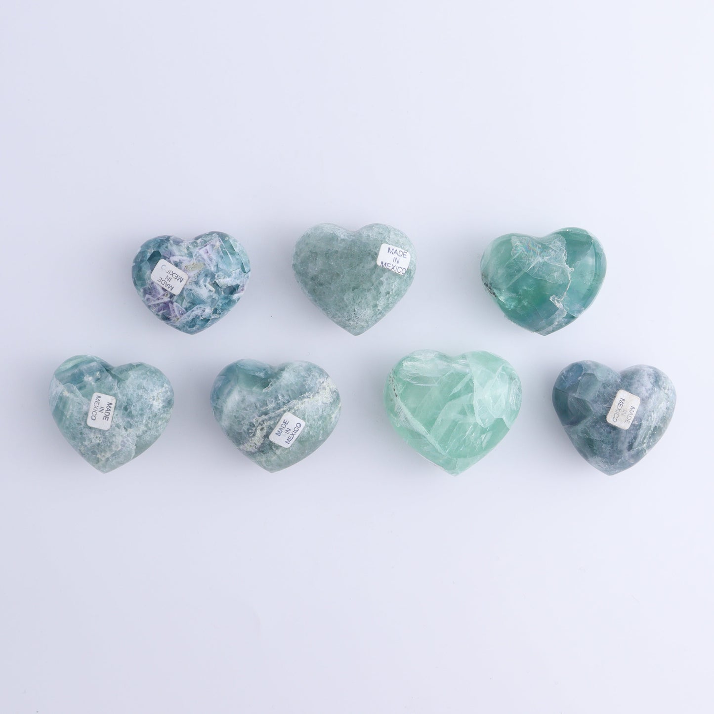Fluorite Hearts Set of 7 - Expert Wholesale and Supplier of Wholesale Crystals & Bulk Gemstones, ["Fluorite","Hearts","Mexico"]