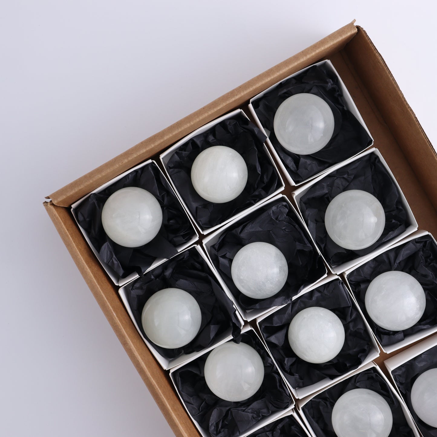 Optical Calcite Spheres Set of 12 - Expert Wholesale and Supplier of Wholesale Crystals & Bulk Gemstones, ["Calcite","Mexico","Optical Calcite","Spheres"]