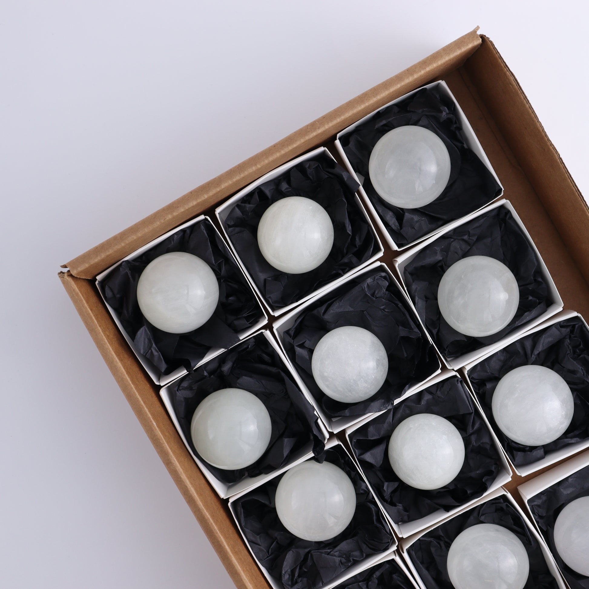 Optical Calcite Spheres Set of 12 - Expert Wholesale and Supplier of Wholesale Crystals & Bulk Gemstones, ["Calcite","Mexico","Optical Calcite","Spheres"]