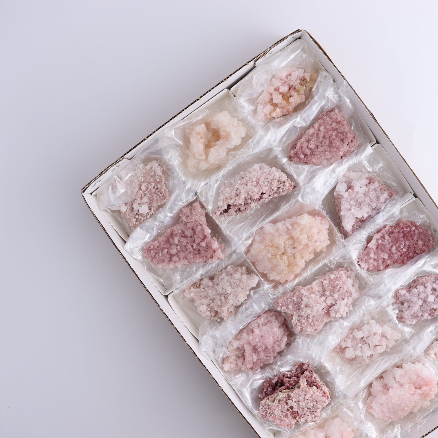Pink Halite Set of 18 - Expert Wholesale and Supplier of Wholesale Crystals & Bulk Gemstones, ["Flats","Halite","Pink Halite","United States"]