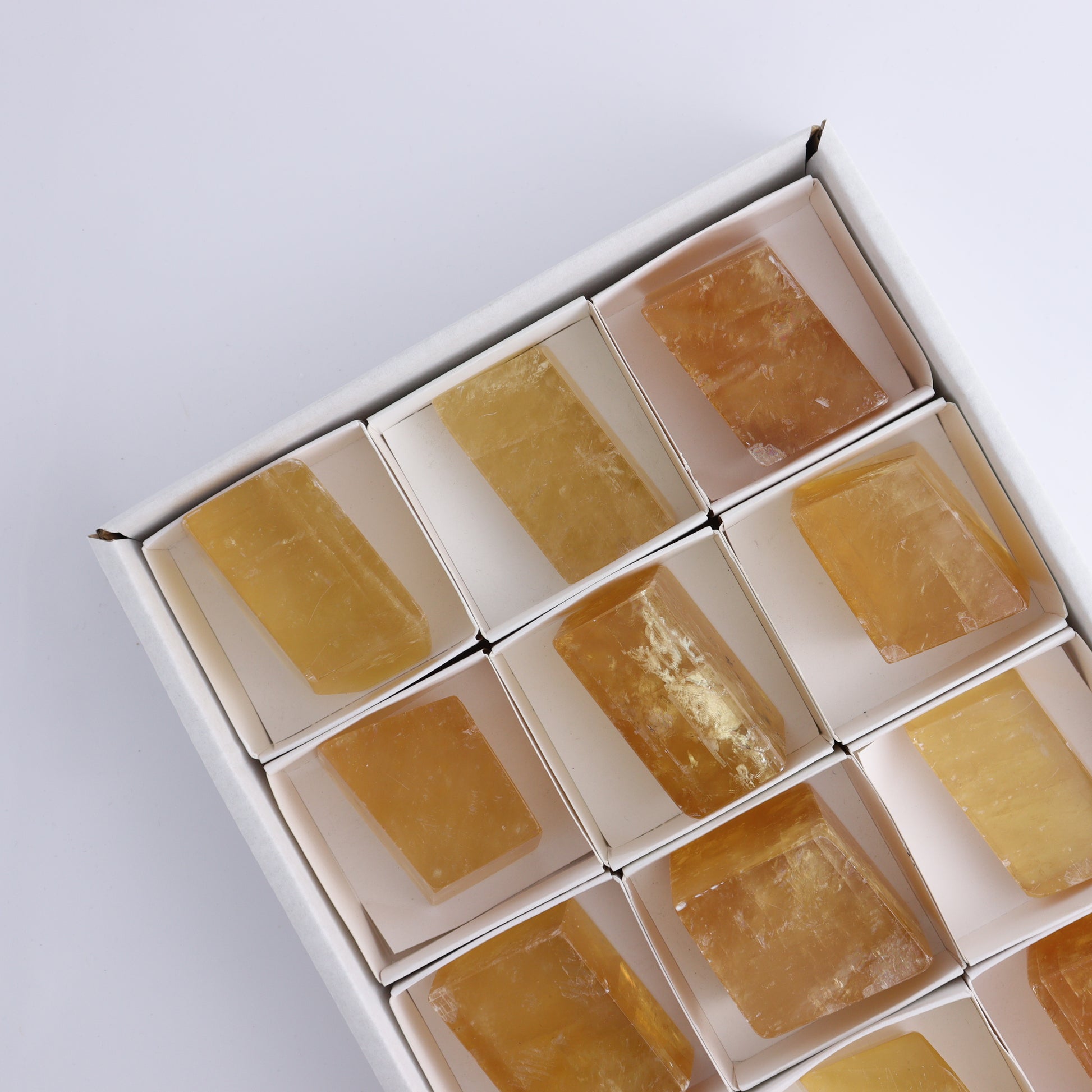 Honey Calcite Freeforms Flat of 12 - Expert Wholesale and Supplier of Wholesale Crystals & Bulk Gemstones, ["Calcite","China","Flats","Freeforms","Honey Calcite"]