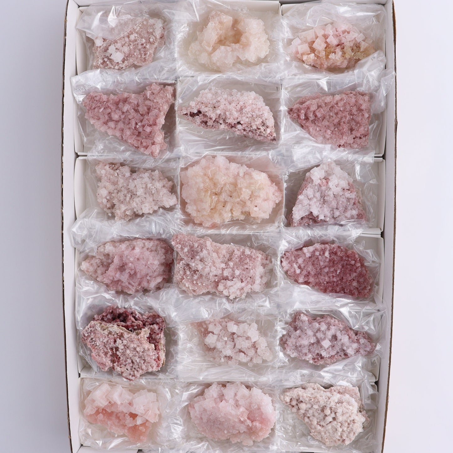 Pink Halite Set of 18 - Expert Wholesale and Supplier of Wholesale Crystals & Bulk Gemstones, ["Flats","Halite","Pink Halite","United States"]