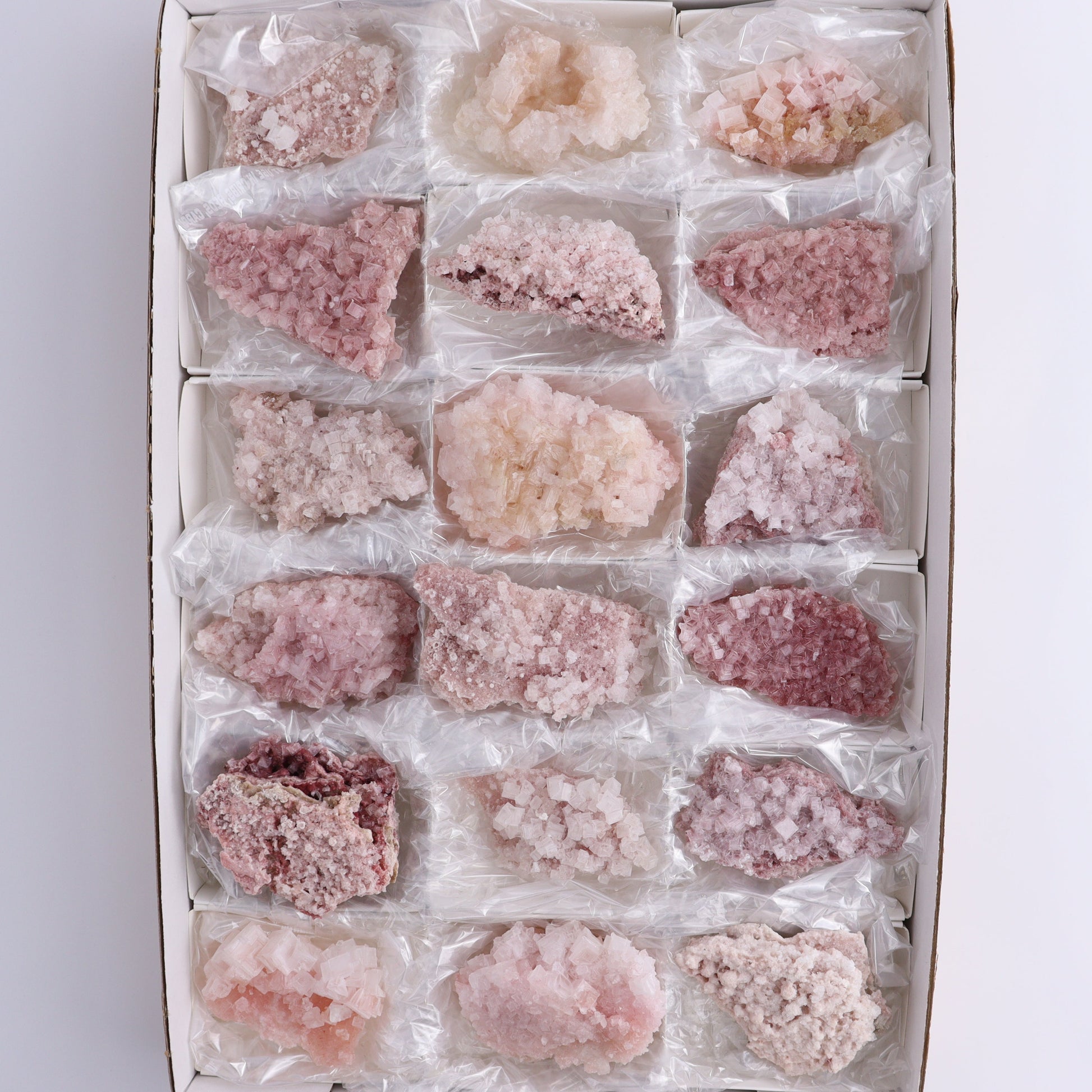 Pink Halite Set of 18 - Expert Wholesale and Supplier of Wholesale Crystals & Bulk Gemstones, ["Flats","Halite","Pink Halite","United States"]