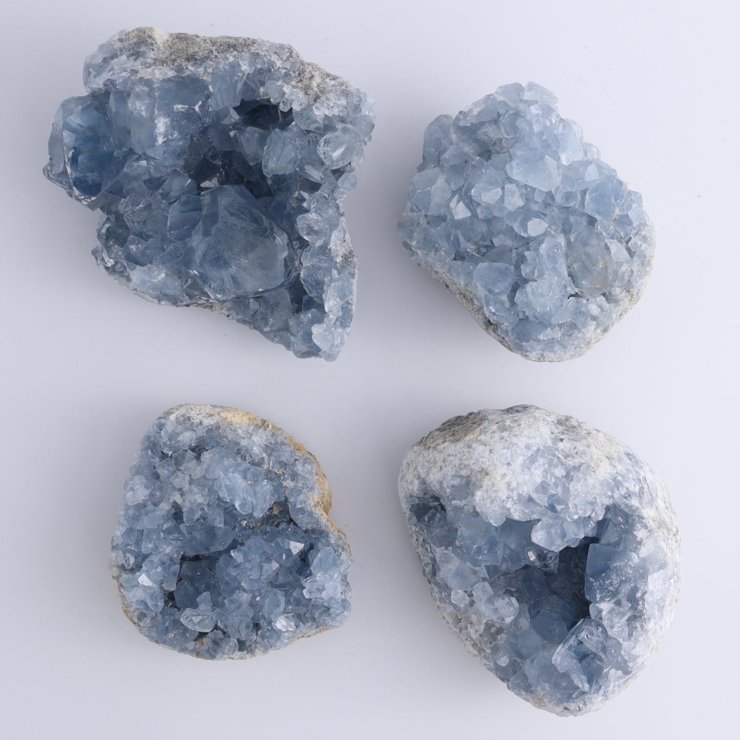 Celestite Clusters Set of 8 - Expert Wholesale and Supplier of Wholesale Crystals & Bulk Gemstones, ["Celestite","Freeform","Madagascar"]