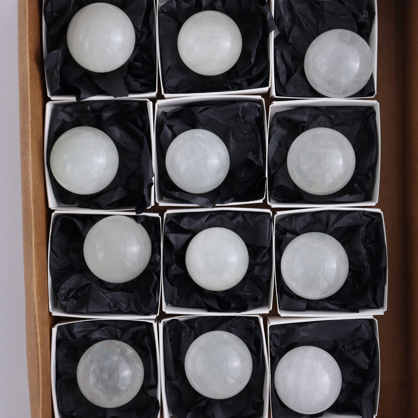 Optical Calcite Spheres Set of 12 - Expert Wholesale and Supplier of Wholesale Crystals & Bulk Gemstones, ["Calcite","Mexico","Optical Calcite","Spheres"]