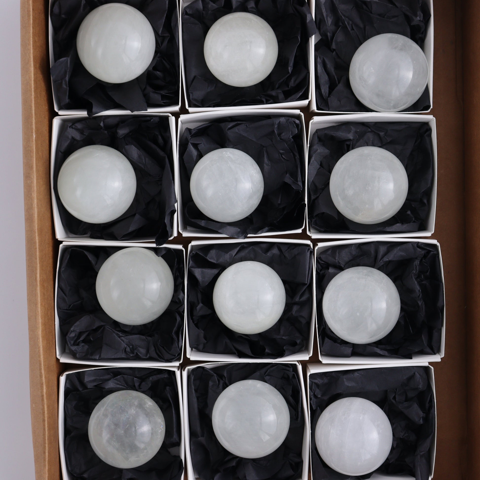 Optical Calcite Spheres Set of 12 - Expert Wholesale and Supplier of Wholesale Crystals & Bulk Gemstones, ["Calcite","Mexico","Optical Calcite","Spheres"]