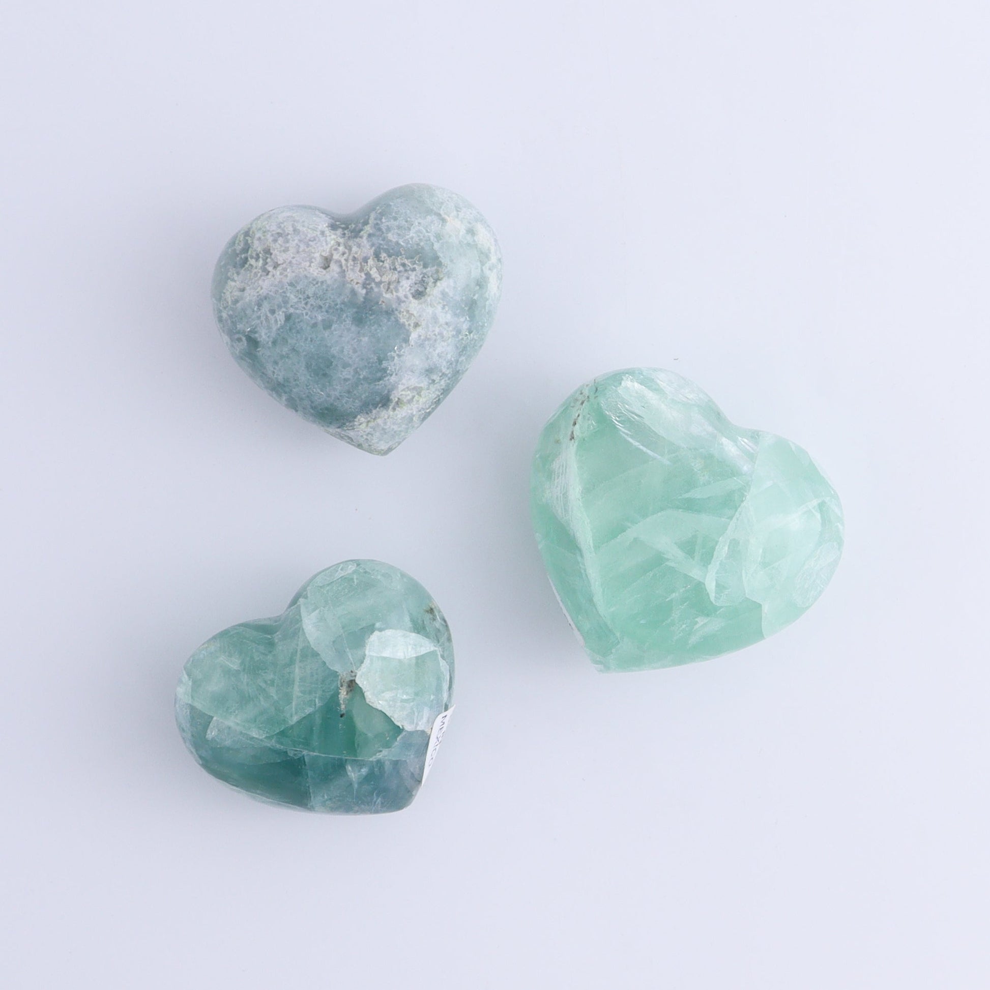 Fluorite Hearts Set of 7 - Expert Wholesale and Supplier of Wholesale Crystals & Bulk Gemstones, ["Fluorite","Hearts","Mexico"]
