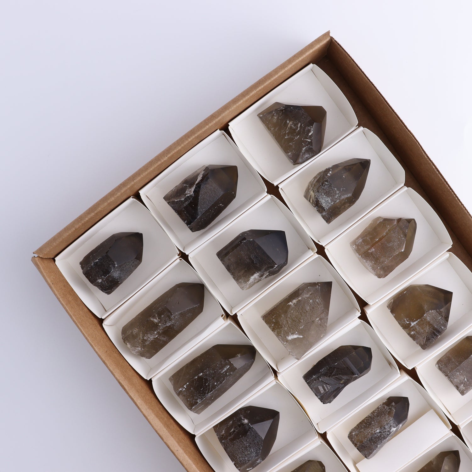 Smoky Quartz Polished Tops Set of 18 - Expert Wholesale and Supplier of Wholesale Crystals & Bulk Gemstones, ["Brazil","close_70","Points","Polished Tip","Quartz","Smoky Quartz"]