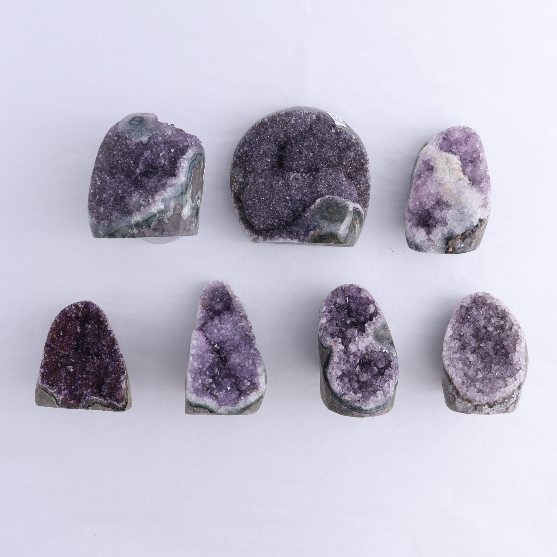 Uruguay Amethyst Cut Base Set of 7 - Expert Wholesale and Supplier of Wholesale Crystals & Bulk Gemstones, ["Amethyst","Cut Base","Uruguay"]