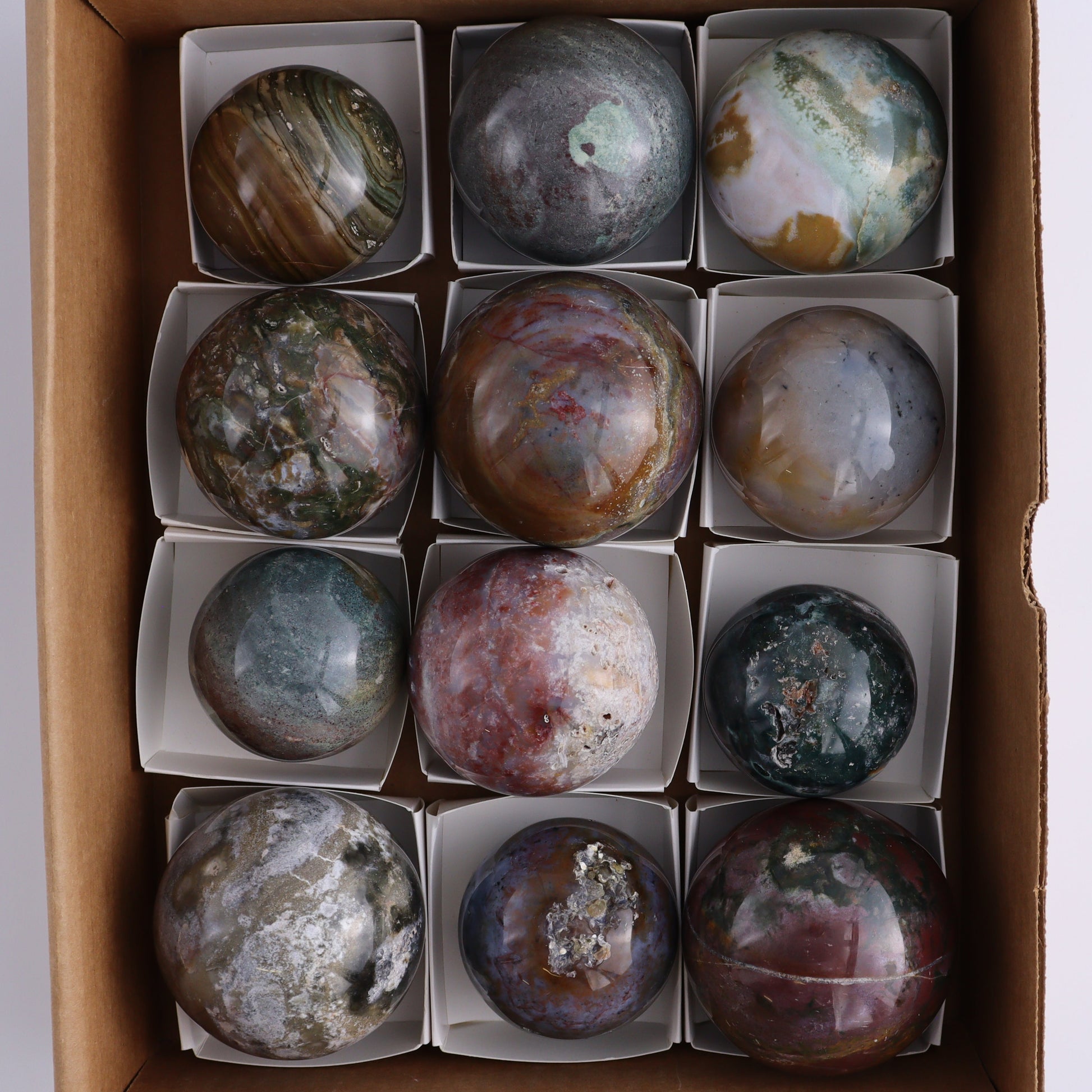 Ocean Jasper Spheres Set of 12 - Expert Wholesale and Supplier of Wholesale Crystals & Bulk Gemstones, ["jasper","Madagascar","Ocean Jasper","Spheres"]