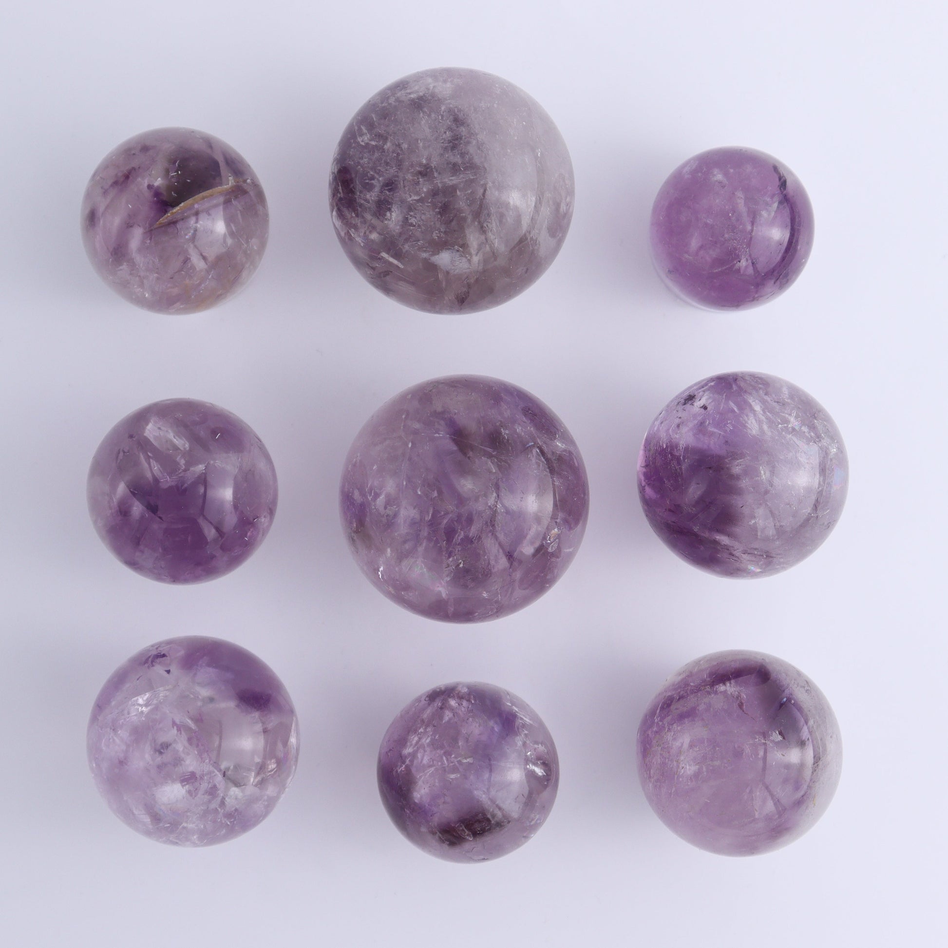 Amethyst Spheres Set of 9 - Expert Wholesale and Supplier of Wholesale Crystals & Bulk Gemstones, ["Amethyst","Brazil","Spheres"]