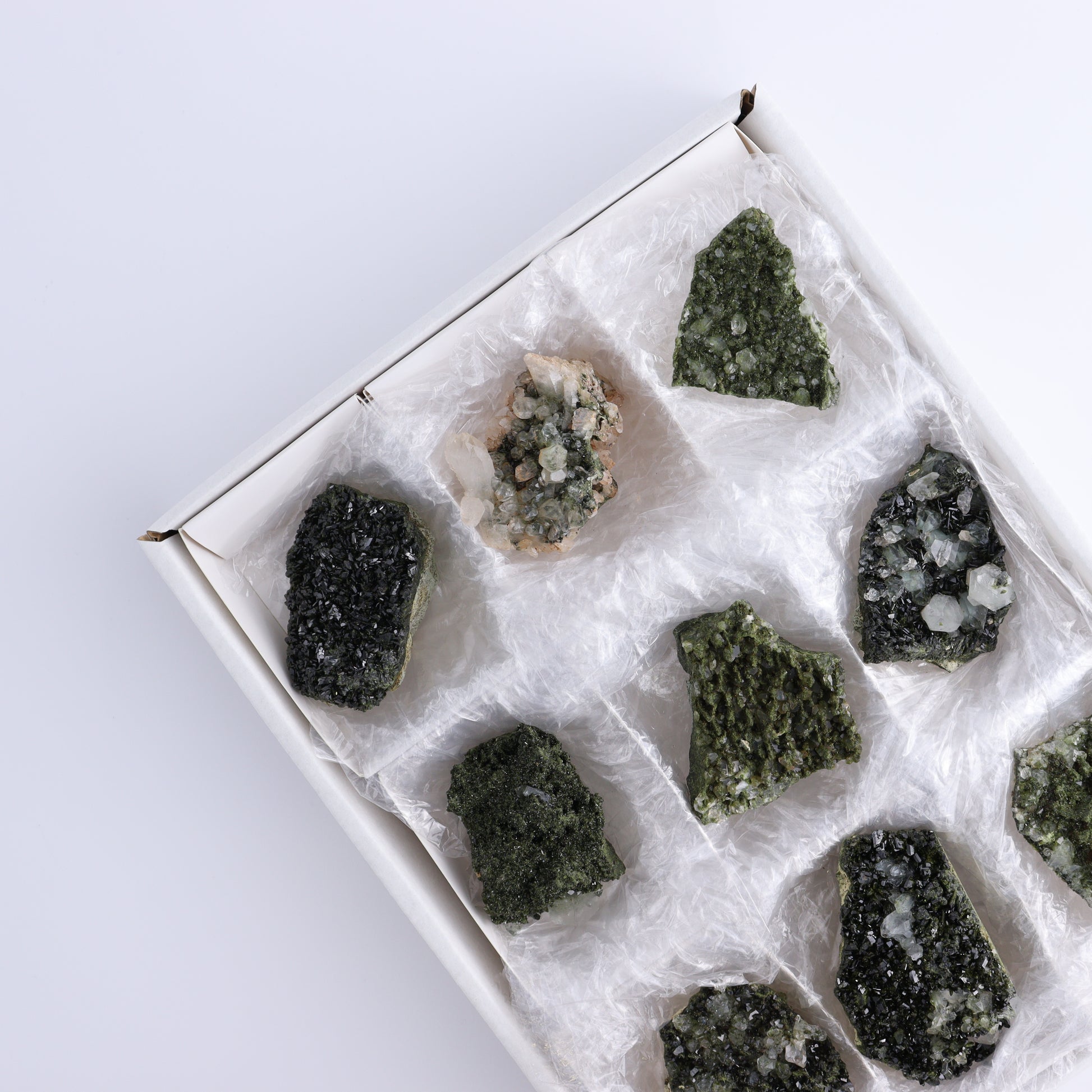 Epidote Set of 9 - Expert Wholesale and Supplier of Wholesale Crystals & Bulk Gemstones, ["epidote","flat","Flats"]