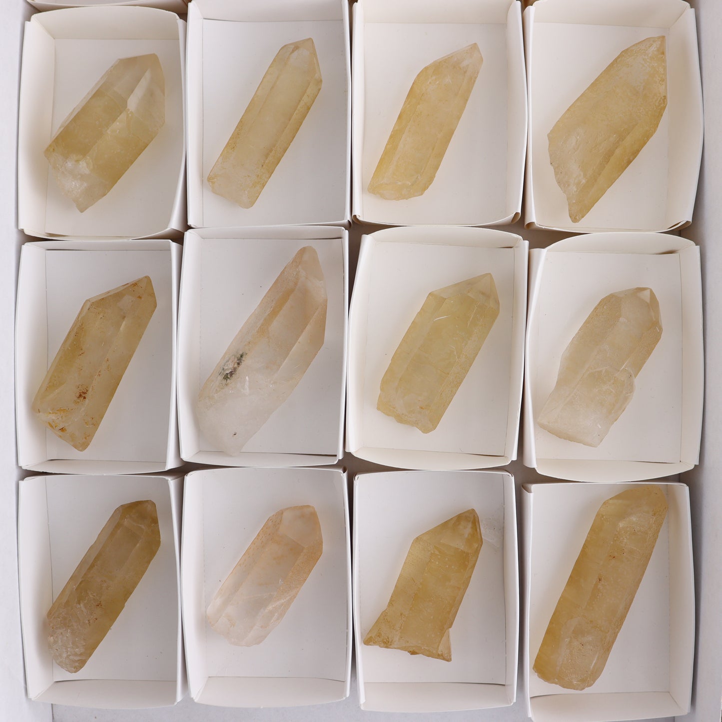Tangerine Quartz Rough Towers Set of 16 - Expert Wholesale and Supplier of Wholesale Crystals & Bulk Gemstones, ["Quartz","Rough","Tangerine Quartz","Towers"]