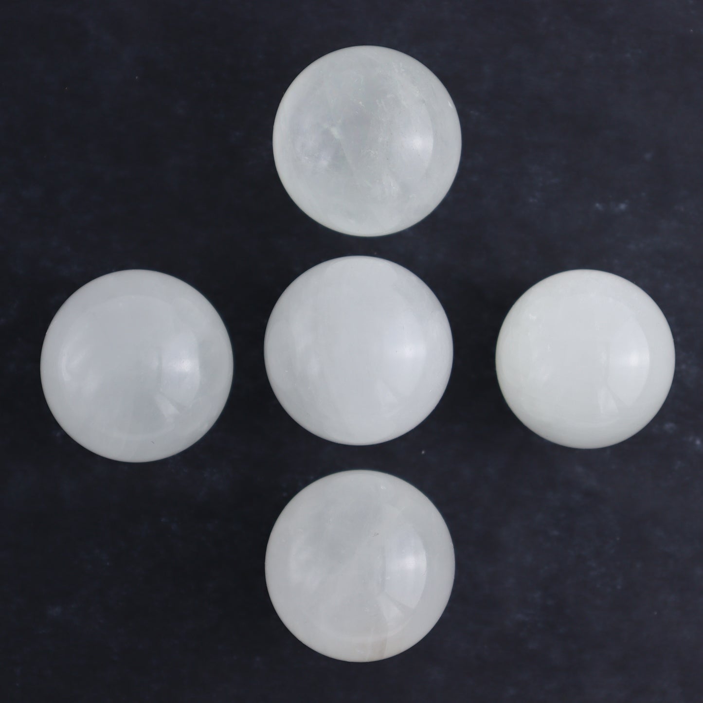 Optical Calcite Spheres Set of 12 - Expert Wholesale and Supplier of Wholesale Crystals & Bulk Gemstones, ["Calcite","Mexico","Optical Calcite","Spheres"]