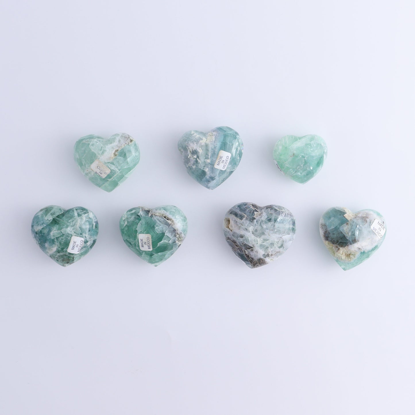 Fluorite Hearts Set of 7 - Expert Wholesale and Supplier of Wholesale Crystals & Bulk Gemstones, ["Fluorite","Hearts","Mexico"]