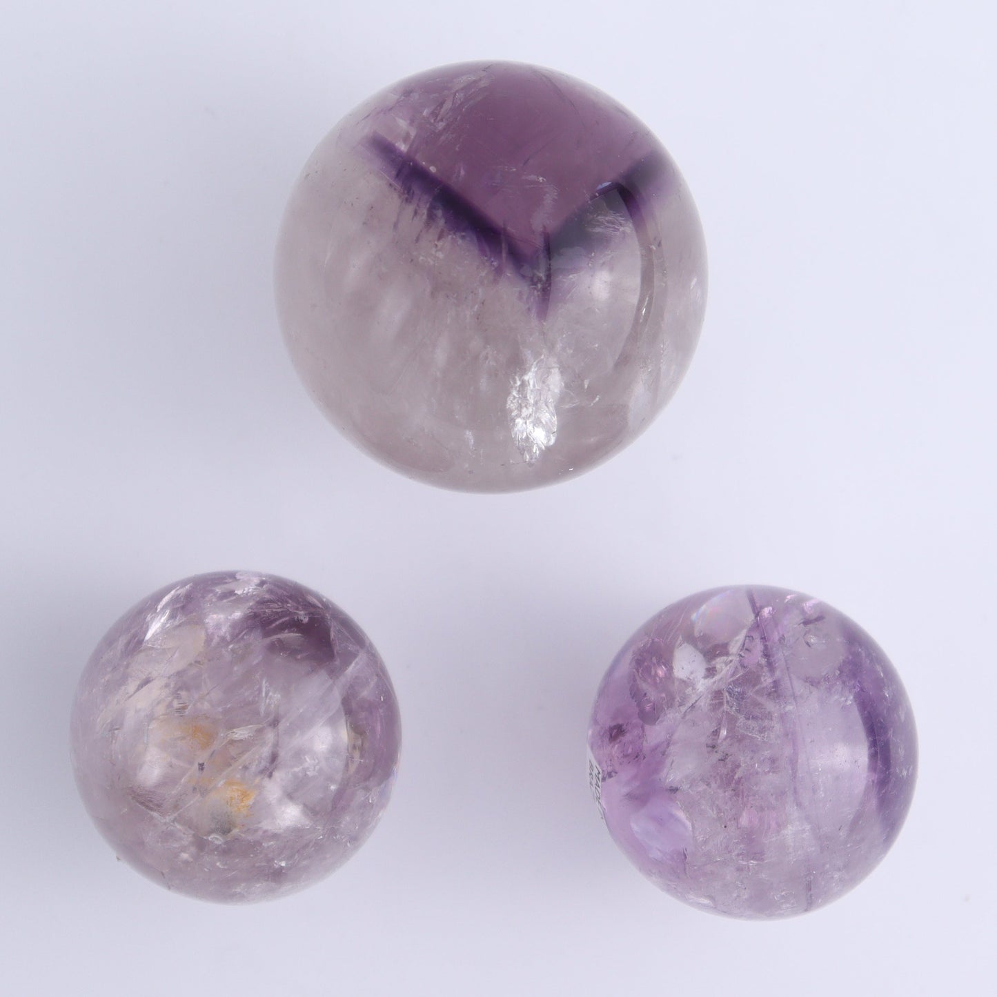 Amethyst Spheres Set of 9 - Expert Wholesale and Supplier of Wholesale Crystals & Bulk Gemstones, ["Amethyst","Brazil","Spheres"]