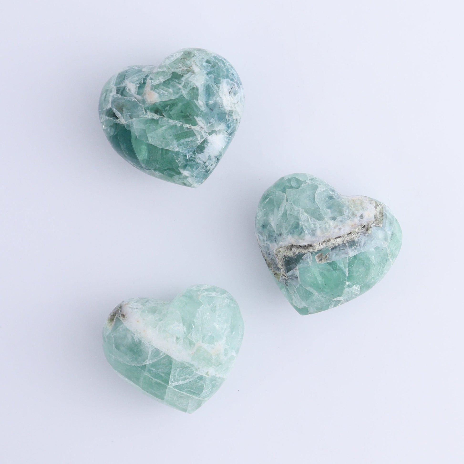 Fluorite Hearts Set of 7 - Expert Wholesale and Supplier of Wholesale Crystals & Bulk Gemstones, ["Fluorite","Hearts","Mexico"]