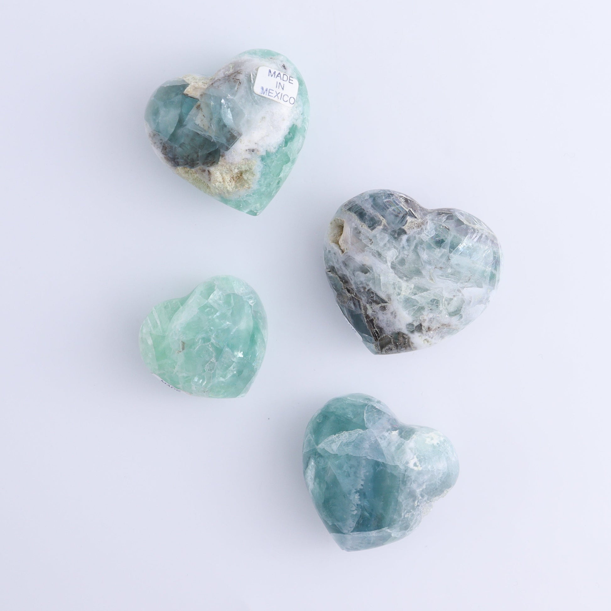 Fluorite Hearts Set of 7 - Expert Wholesale and Supplier of Wholesale Crystals & Bulk Gemstones, ["Fluorite","Hearts","Mexico"]