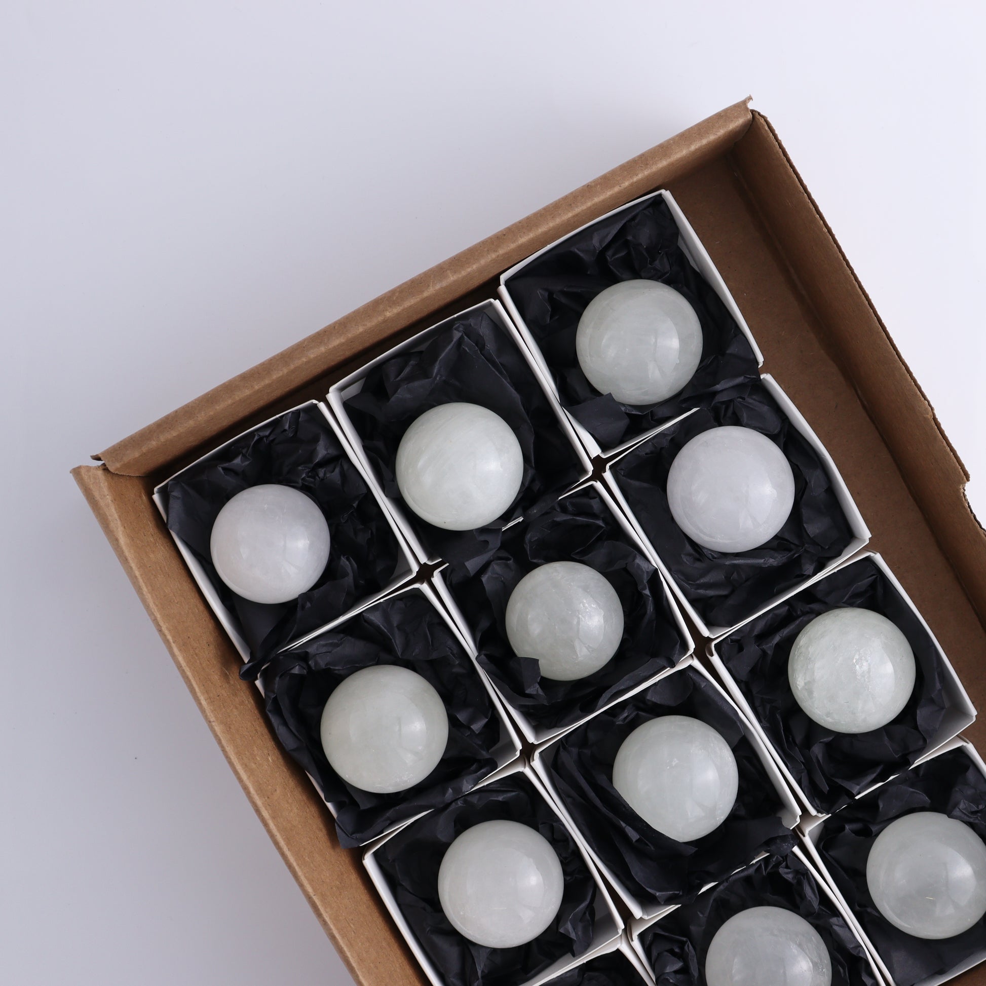 Optical Calcite Spheres Set of 12 - Expert Wholesale and Supplier of Wholesale Crystals & Bulk Gemstones, ["Calcite","Mexico","Optical Calcite","Spheres"]