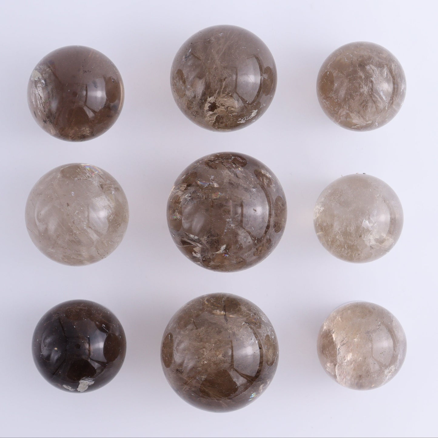 Smoky Quartz Spheres Set of 9 - Expert Wholesale and Supplier of Wholesale Crystals & Bulk Gemstones, ["Quartz","Smoky Quartz","Spheres"]