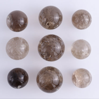 Smoky Quartz Spheres Set of 9 - Expert Wholesale and Supplier of Wholesale Crystals & Bulk Gemstones, ["Quartz","Smoky Quartz","Spheres"]