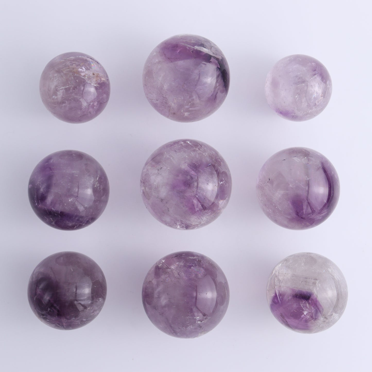 Amethyst Spheres Set of 9 - Expert Wholesale and Supplier of Wholesale Crystals & Bulk Gemstones, ["Amethyst","Brazil","Spheres"]