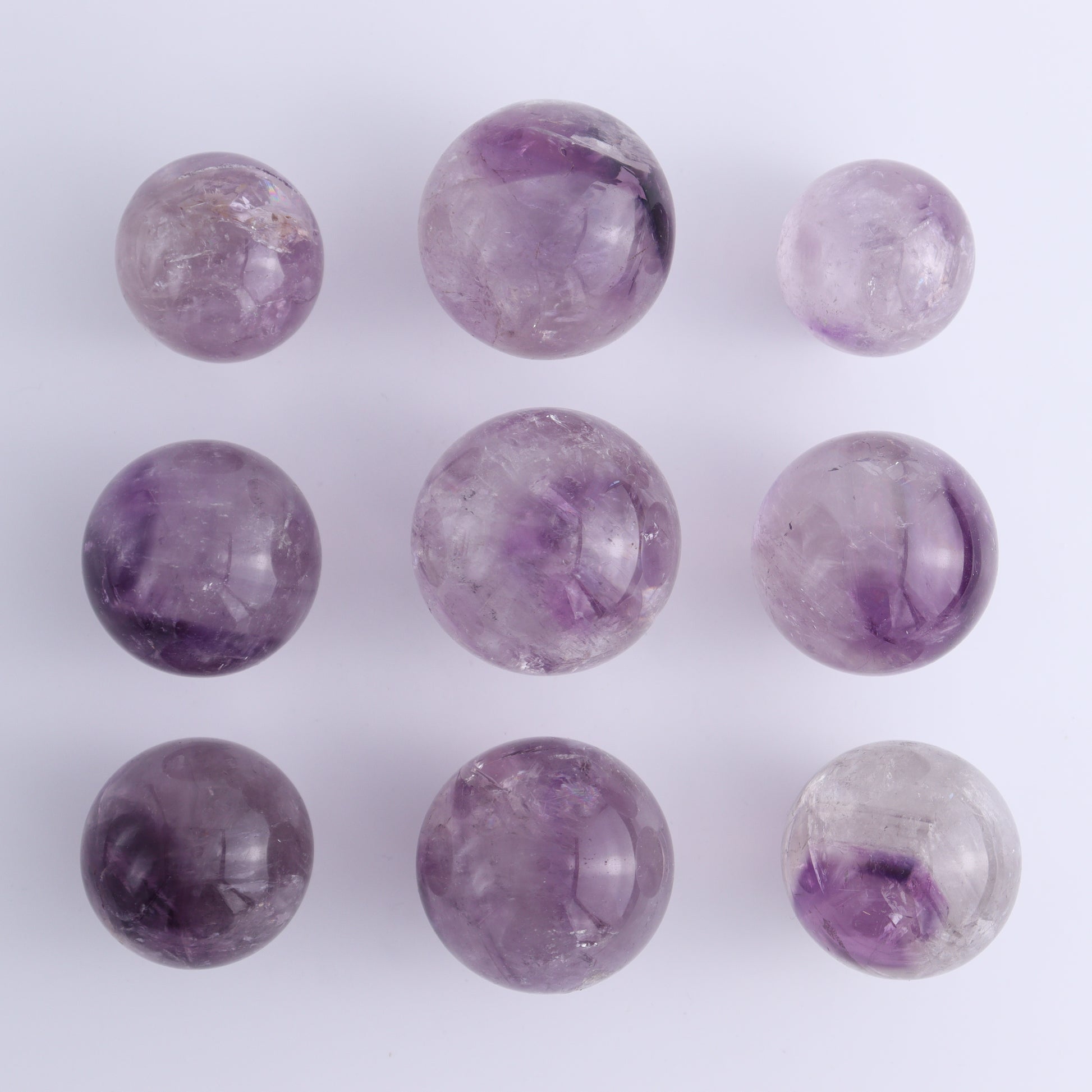 Amethyst Spheres Set of 9 - Expert Wholesale and Supplier of Wholesale Crystals & Bulk Gemstones, ["Amethyst","Brazil","Spheres"]