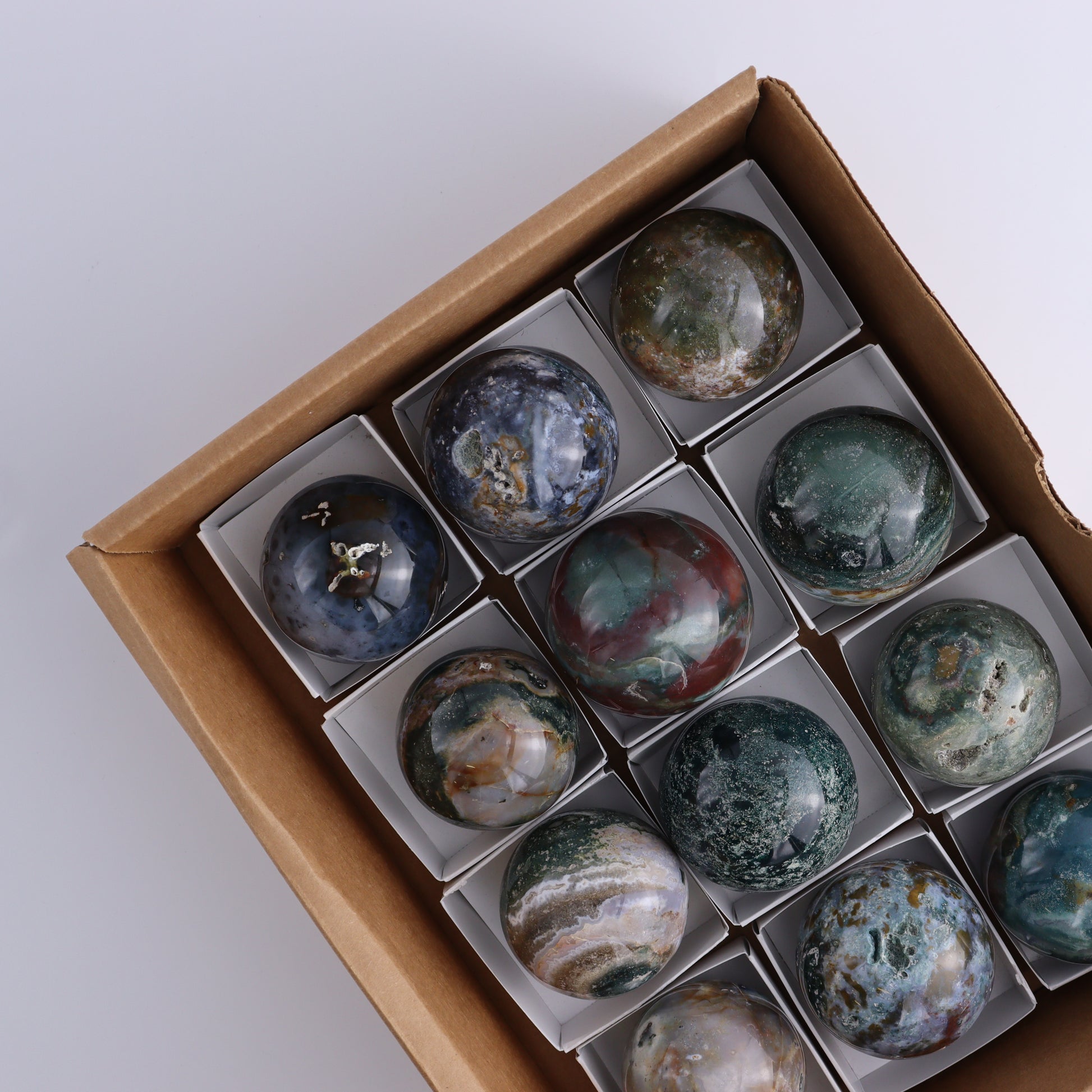 Ocean Jasper Spheres Set of 12 - Expert Wholesale and Supplier of Wholesale Crystals & Bulk Gemstones, ["jasper","Madagascar","Ocean Jasper","Spheres"]