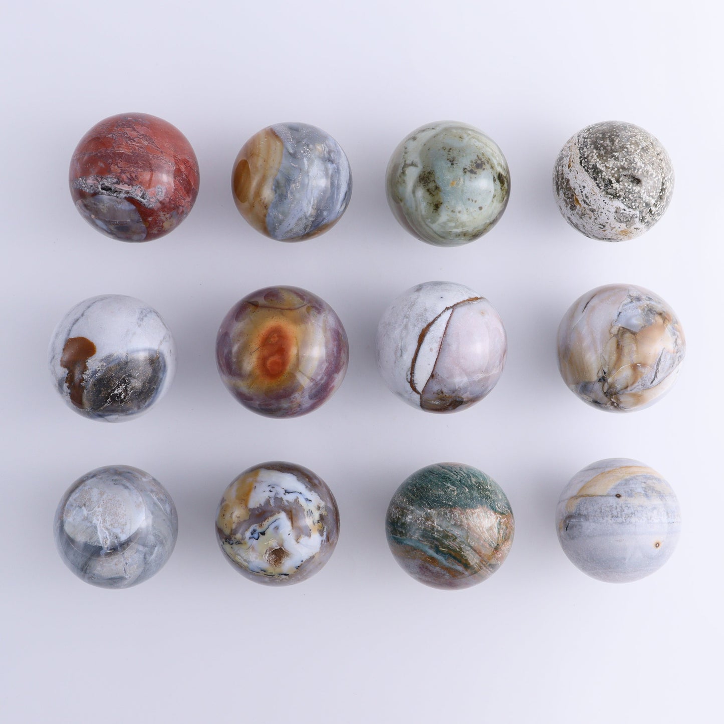 Ocean Jasper Spheres Set of 12 - Expert Wholesale and Supplier of Wholesale Crystals & Bulk Gemstones, ["jasper","Madagascar","Ocean Jasper","Spheres"]