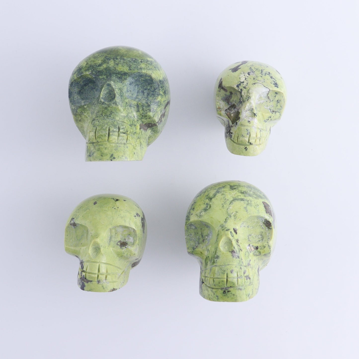 Serpentine Skulls Set of 4