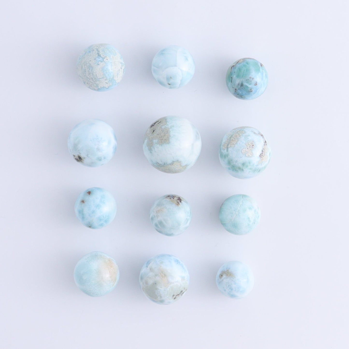 Larmiar Spheres Set of 12 - Expert Wholesale and Supplier of Wholesale Crystals & Bulk Gemstones, ["Larimar","Spheres"]
