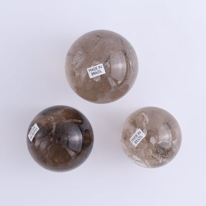 Smoky Quartz Spheres Set of 9 - Expert Wholesale and Supplier of Wholesale Crystals & Bulk Gemstones, ["Quartz","Smoky Quartz","Spheres"]