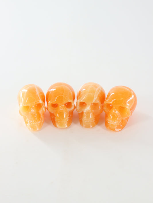 Orange Calcite Skulls Set of 4 - Expert Wholesale and Supplier of Wholesale Crystals & Bulk Gemstones, ["Calcite","Orange Calcite","Skulls"]