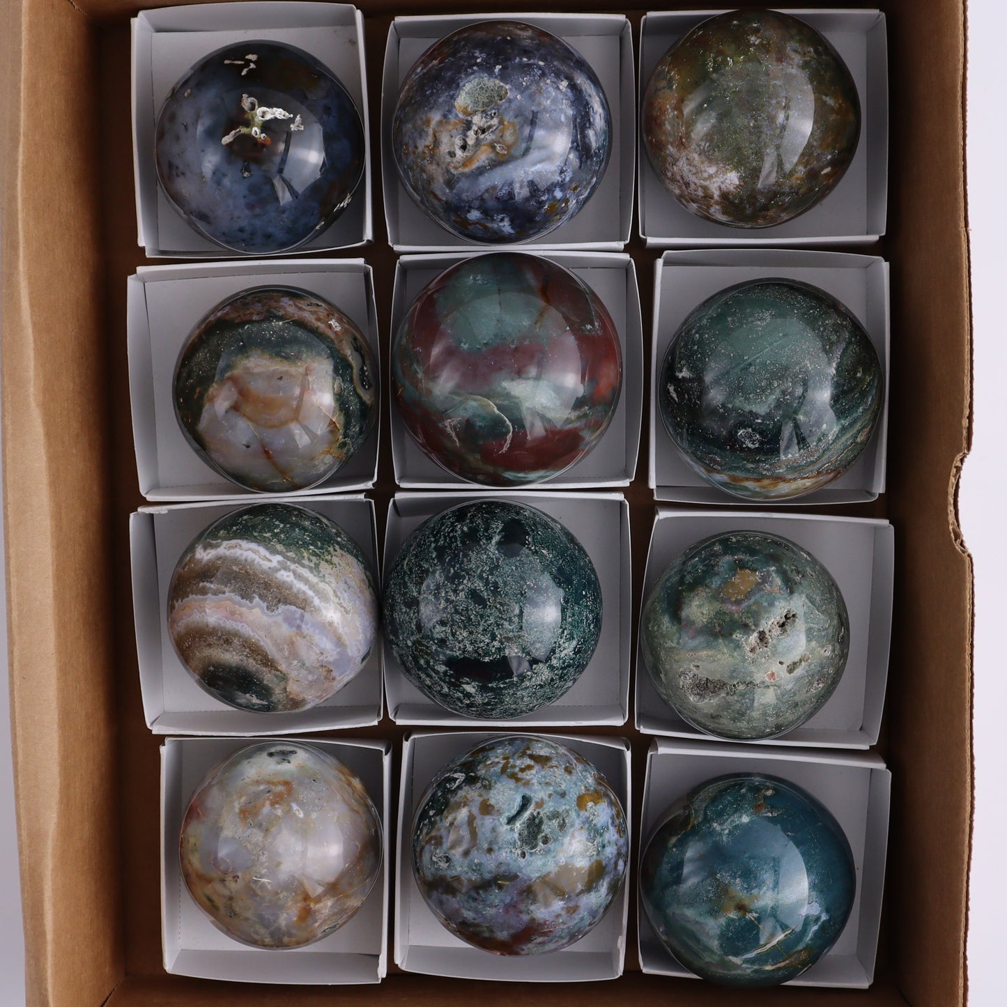 Ocean Jasper Spheres Set of 12 - Expert Wholesale and Supplier of Wholesale Crystals & Bulk Gemstones, ["jasper","Madagascar","Ocean Jasper","Spheres"]