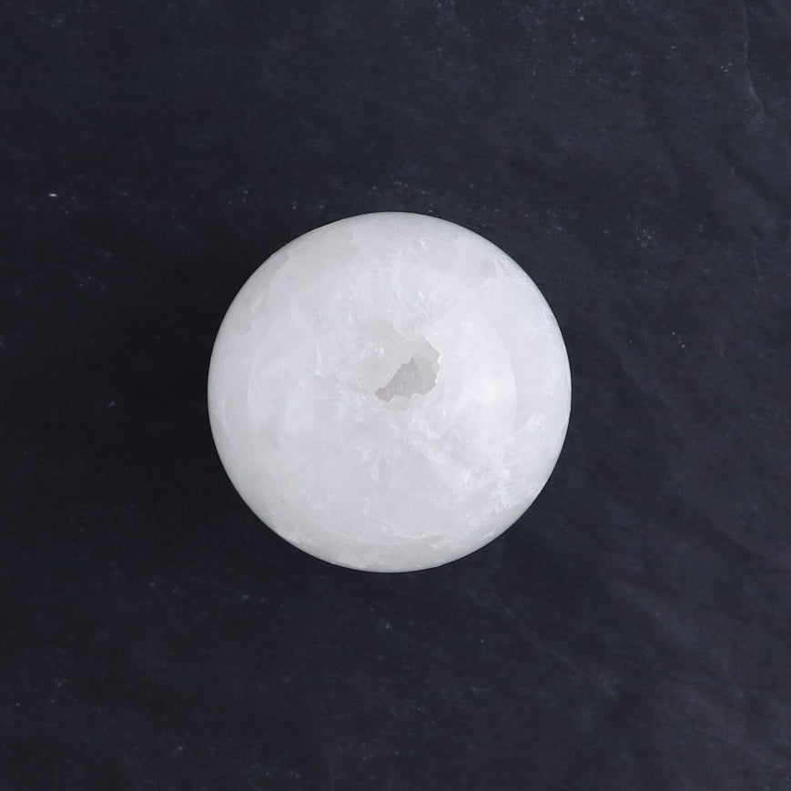 One Small White Quartz Sphere