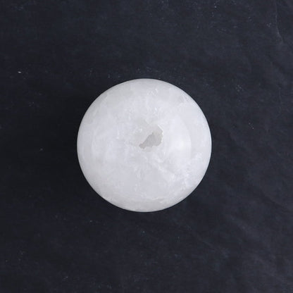 One Small White Quartz Sphere