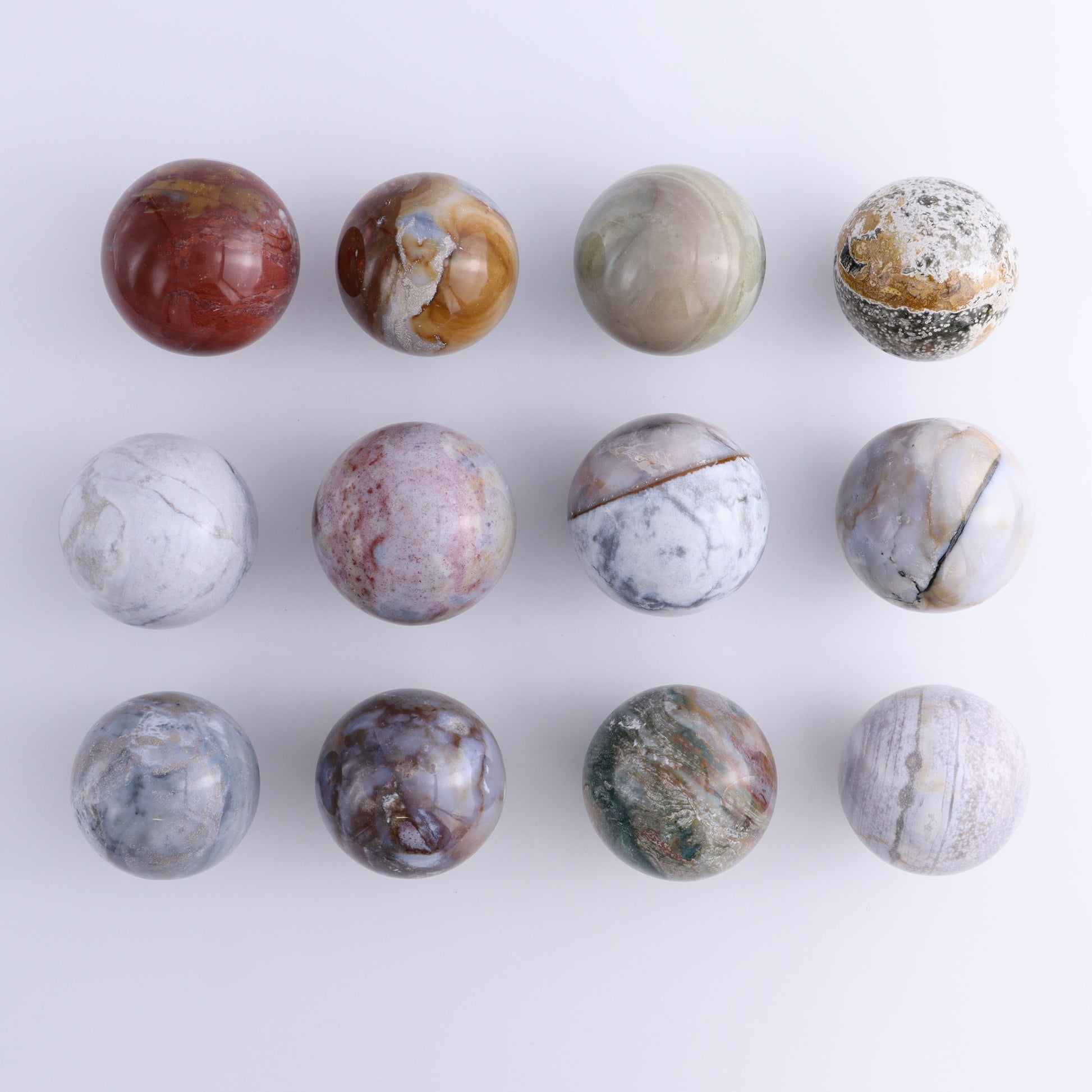 Ocean Jasper Spheres Set of 12 - Expert Wholesale and Supplier of Wholesale Crystals & Bulk Gemstones, ["jasper","Madagascar","Ocean Jasper","Spheres"]
