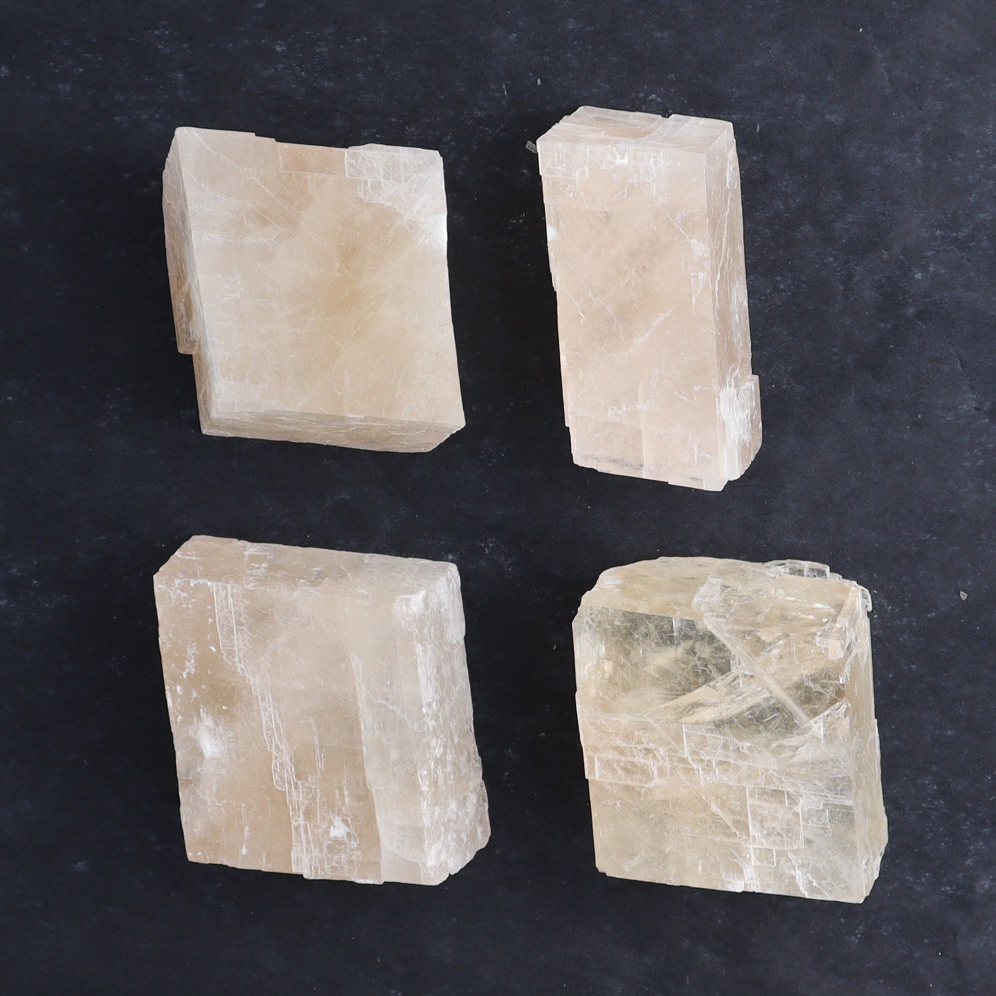 Pink Optical Calcite (Fluorescent) Set of 24 - Expert Wholesale and Supplier of Wholesale Crystals & Bulk Gemstones, ["Calcite","Mexico","Optical Calcite"]