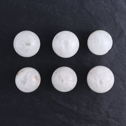 One Small White Quartz Sphere