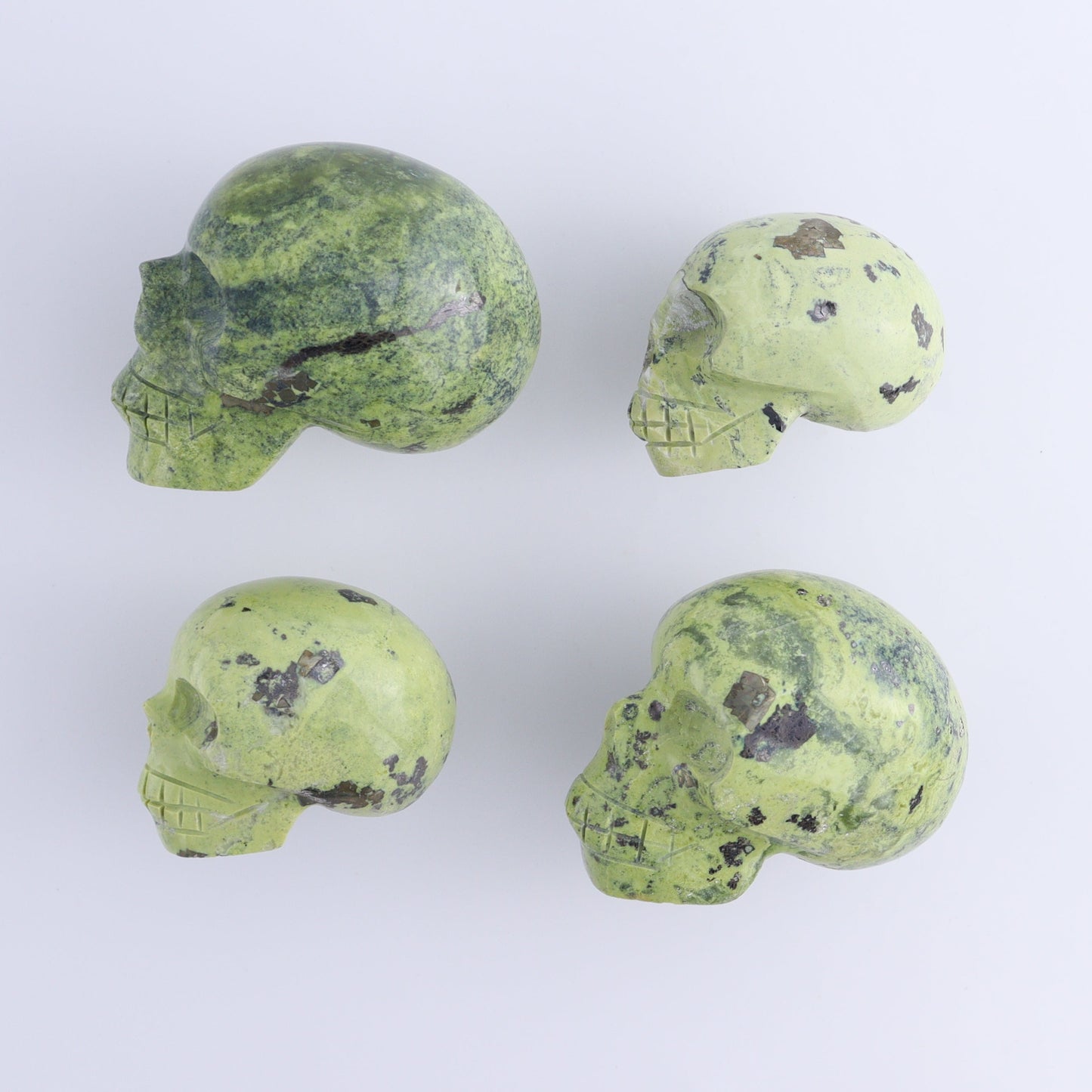 Serpentine Skulls Set of 4