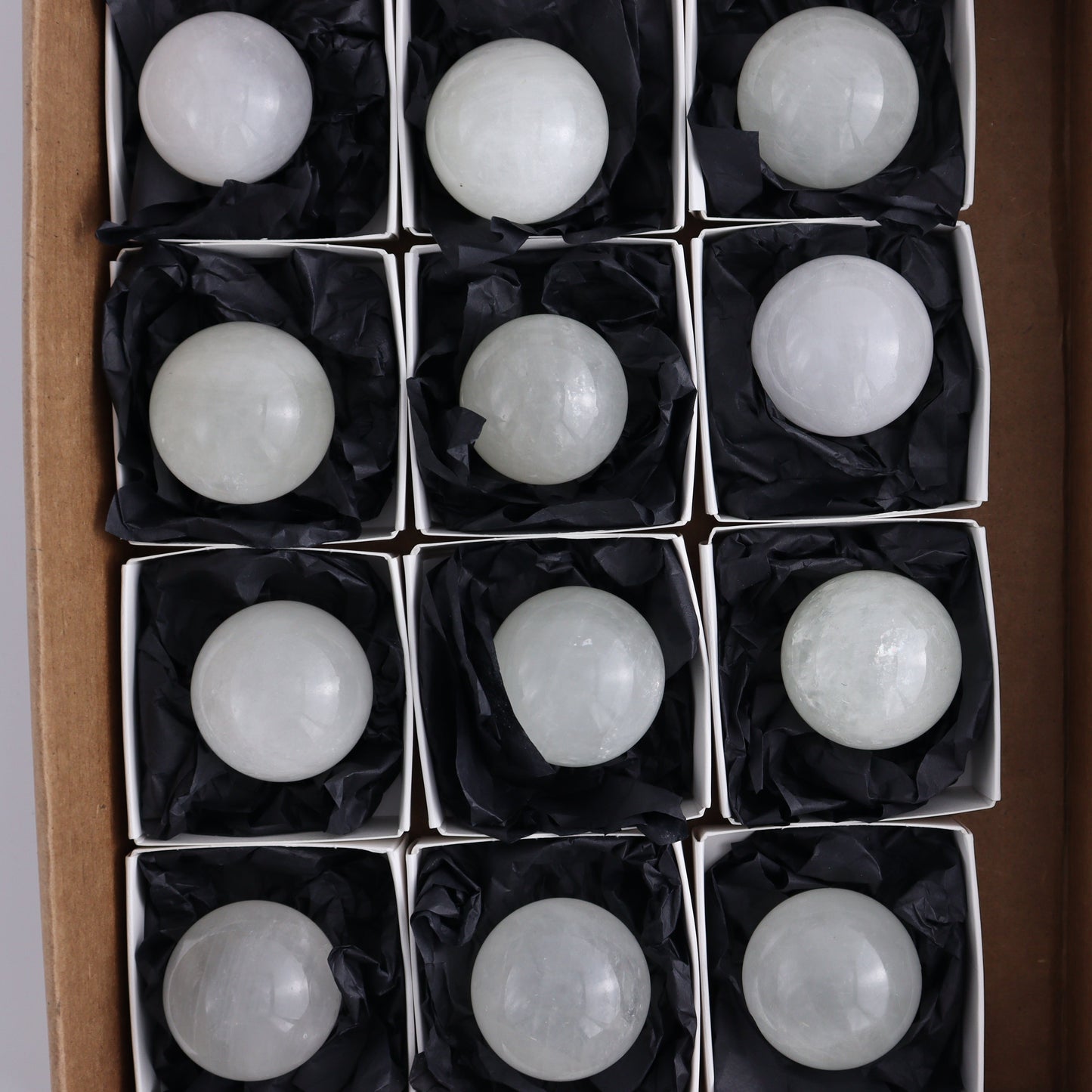 Optical Calcite Spheres Set of 12 - Expert Wholesale and Supplier of Wholesale Crystals & Bulk Gemstones, ["Calcite","Mexico","Optical Calcite","Spheres"]