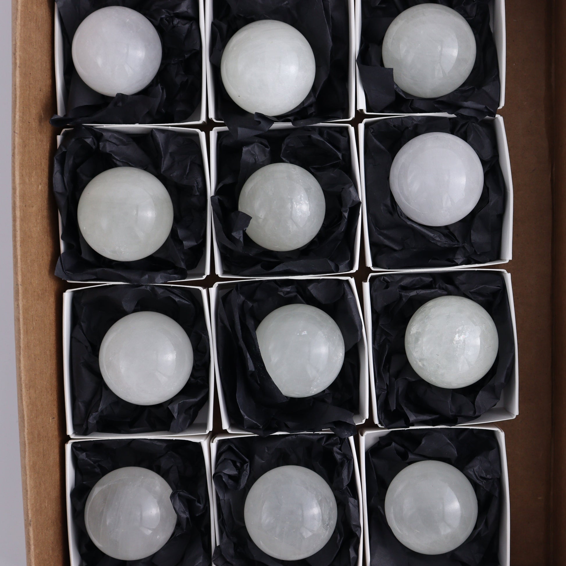 Optical Calcite Spheres Set of 12 - Expert Wholesale and Supplier of Wholesale Crystals & Bulk Gemstones, ["Calcite","Mexico","Optical Calcite","Spheres"]