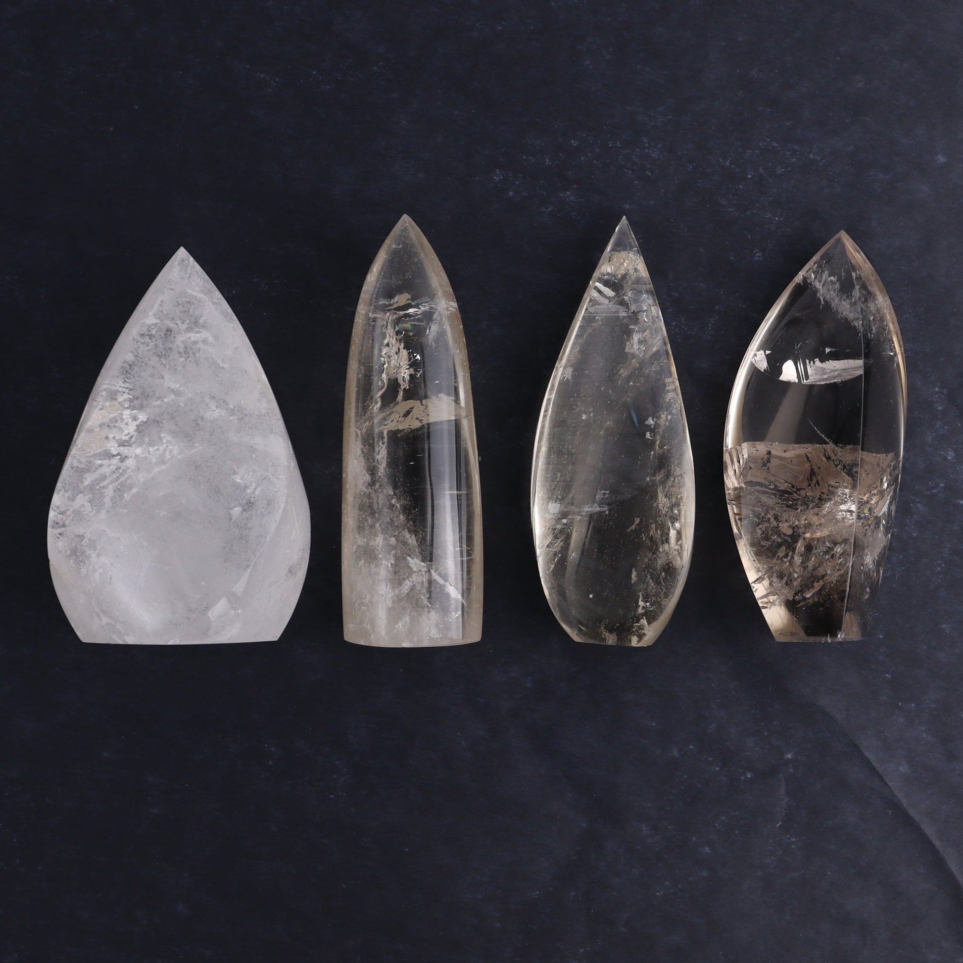 Imperfect Clear and Smoky Quartz Flames Set of 4 - Expert Wholesale and Supplier of Wholesale Crystals & Bulk Gemstones, ["Brazil","Clear Quartz","flames","Quartz","Smoky Quartz"]